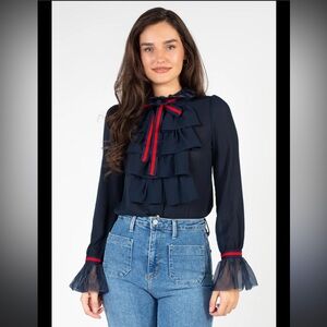 Chelsea Charlotte Navy Ruffle front Tie-Neck Blouse with Red Ribbon Detail